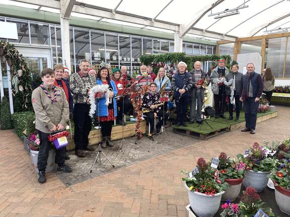 Carol singing with Scouts fundraising